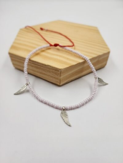 Tobillera Chaquiras Blancas y alas plata